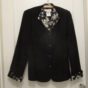 Black blazer with contrasting fabric on lapel and cuffs by Miss Dorby; size 14